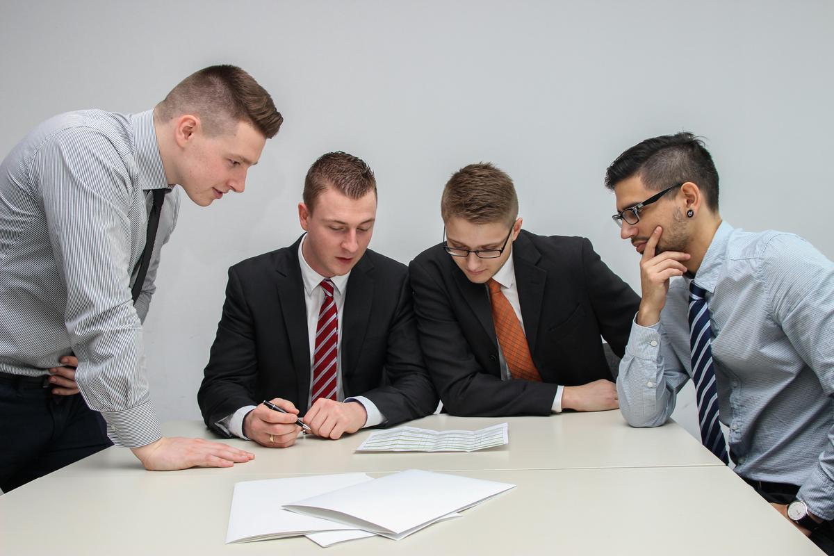 A professional and realistic image depicting a landlord and a former tenant discussing rent collection post-eviction in a civil manner