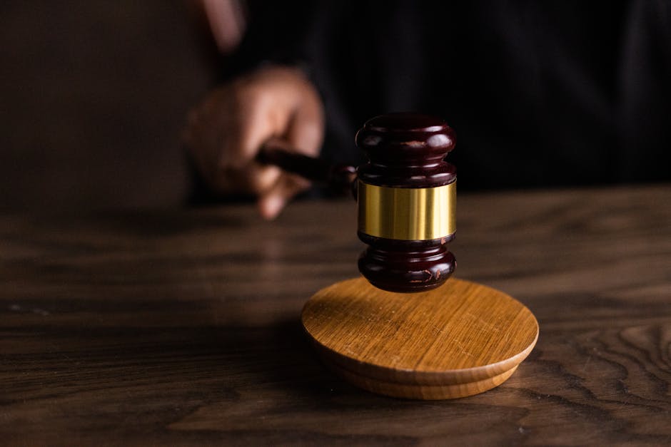Illustration of a courtroom scene with a judge, plaintiff, and defendant in a small claims court setting