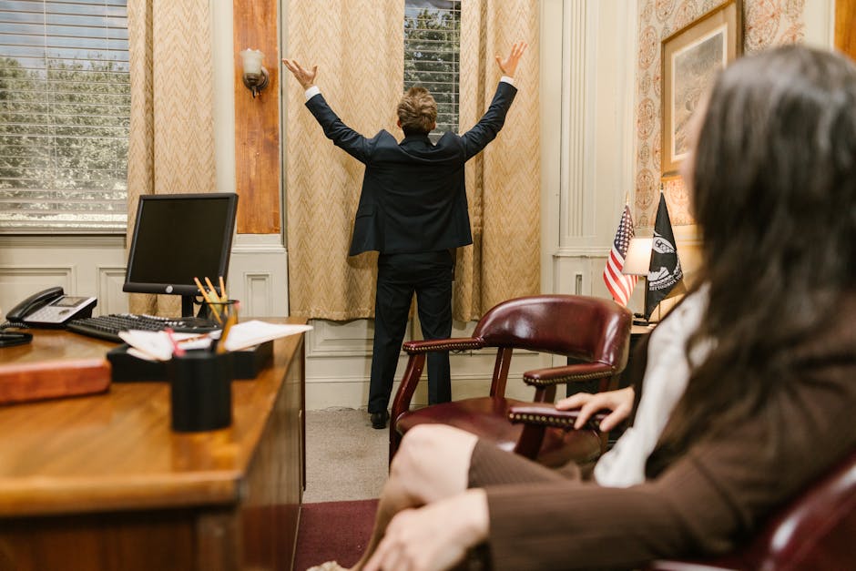 A realistic image depicting a landlord and a tenant in a courtroom discussing unpaid rent