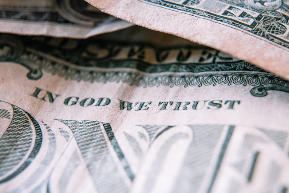 A realistic image showing a person's paycheck being garnished to pay off a debt