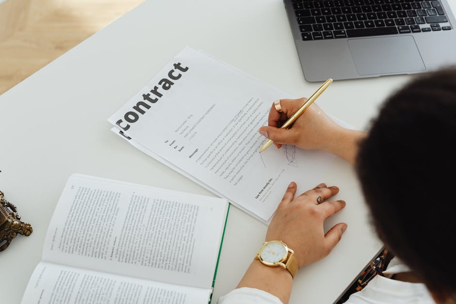 Illustration of a person holding a pen and a contract symbolizing early termination clauses in lease agreements.