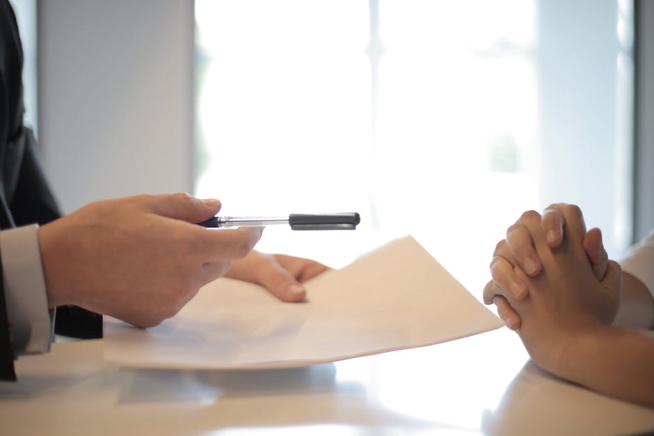 Illustration of a person holding a broken lease contract, representing early termination of a lease agreement