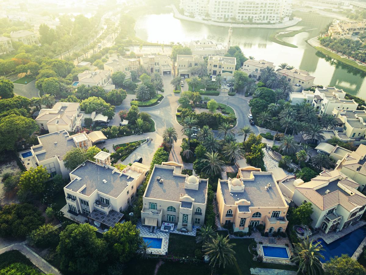 Image of a residential area in Maryland with houses and trees.