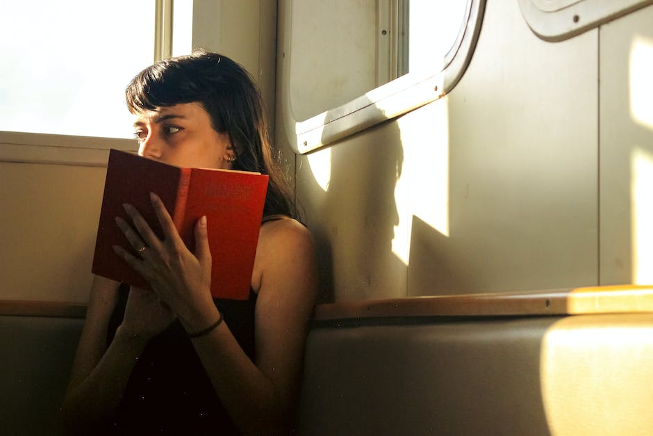 Illustration of a person reading a document with Maryland's rental laws written on it, symbolizing the importance of knowing and following these laws.