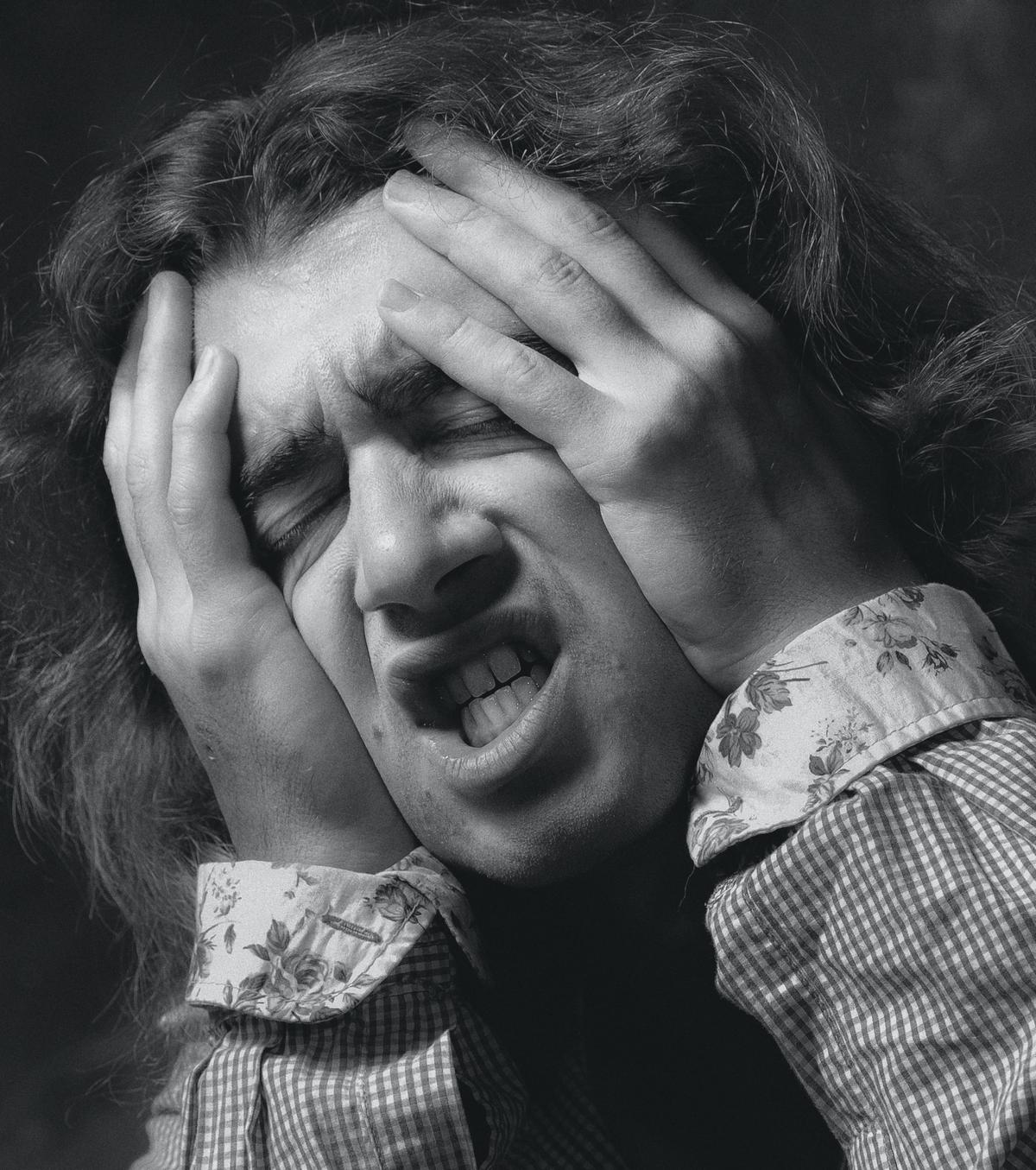Image depicting a frustrated property owner discussing issues with a property manager