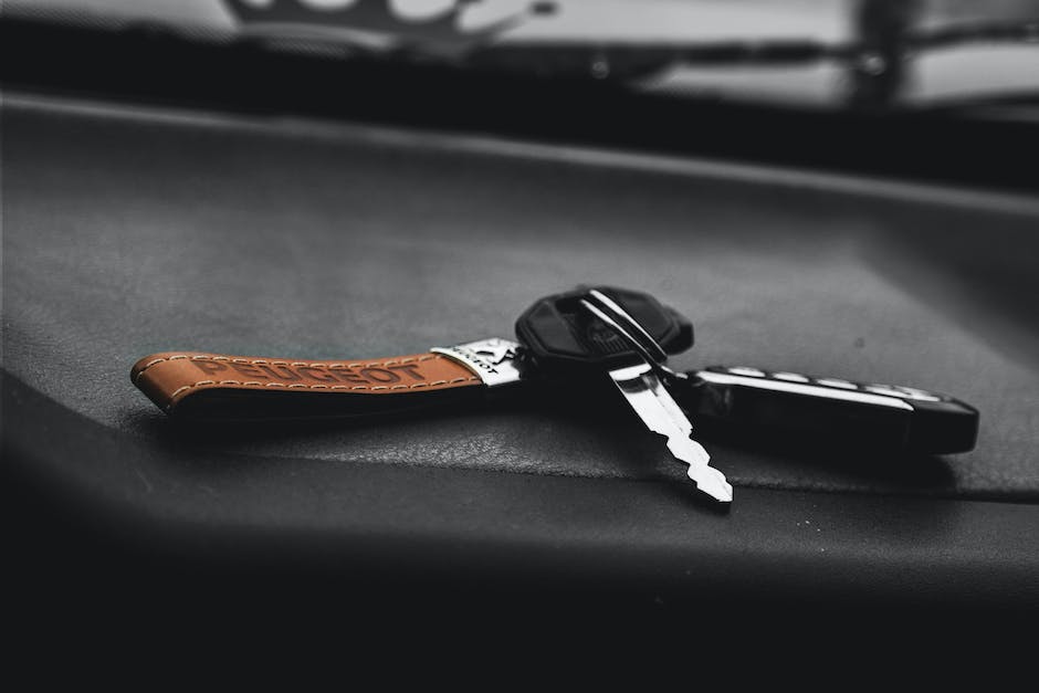 Illustration of a property manager holding a key, representing the implications of changing property managers.