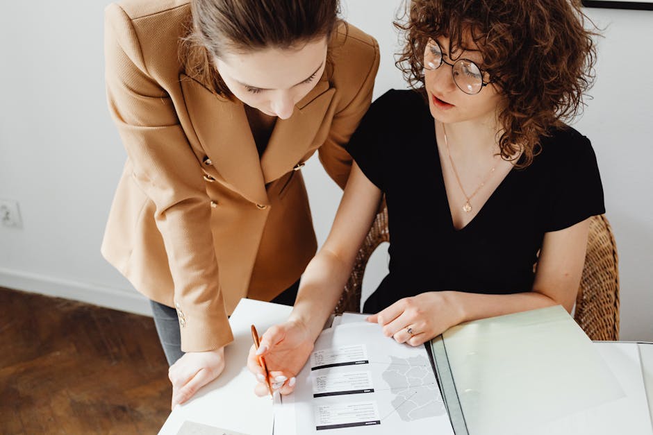 A realistic image depicting a landlord reviewing financial documents of a potential tenant in an office setting
